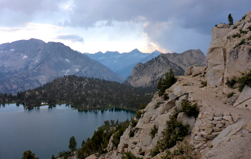 Hiking Trail above Bullfrog Lake with mountains in the background