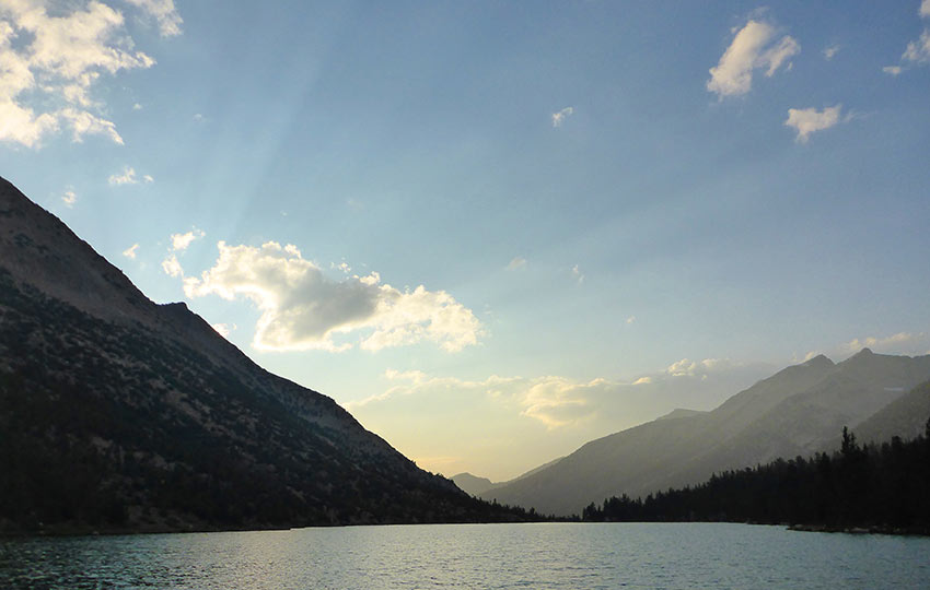 Charlotte Lake surrounded by mountains at sunset