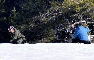 Tom Cruise running through the snow while filming Top Gun 2