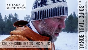Man cross-country skiing in rainy weather